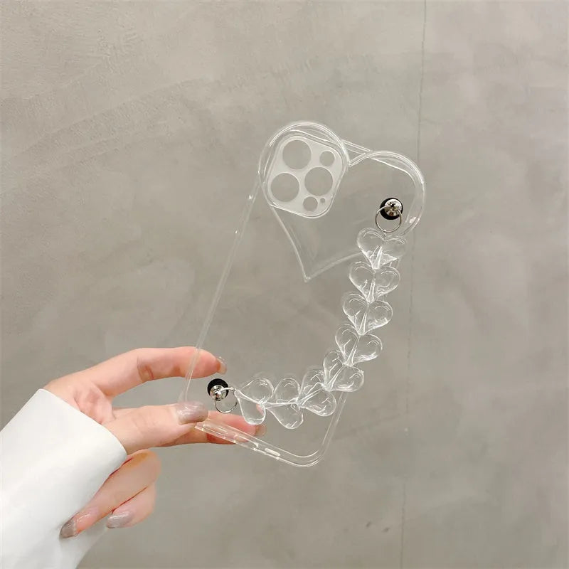 Transparent TPU iPhone case with love bracelet heart chain design on a mobile phone.