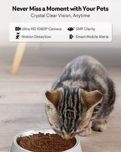 Automatic cat feeder with built-in camera on kitchen floor next to food bowl.