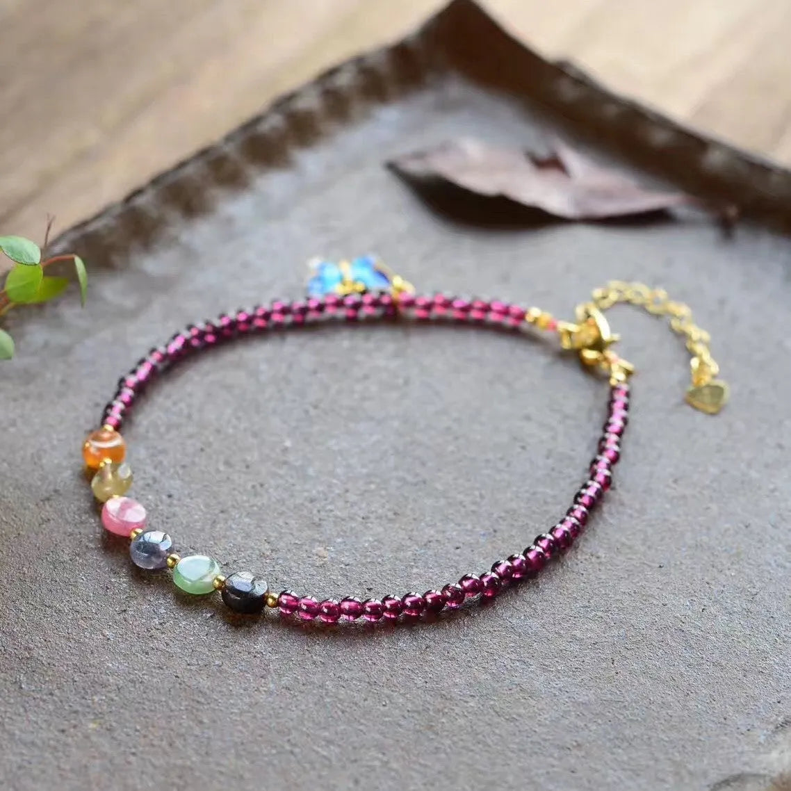 Women's garnet anklets with geometric design and purple gemstone beads