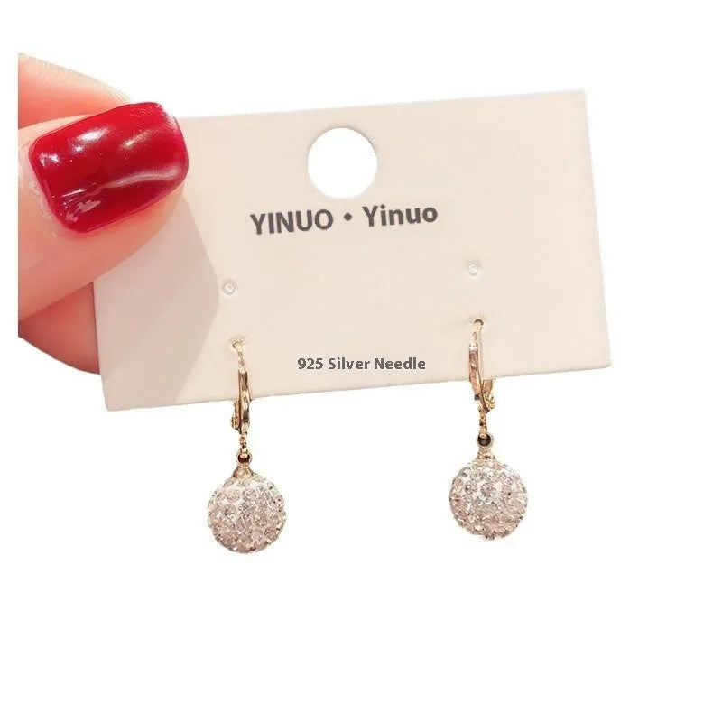 Geometric copper women's earrings with zircon accents and rose design elements in multiple colour variations