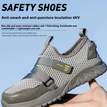 Men's grey anti-smash work safety shoes with flying woven upper and rubber sole