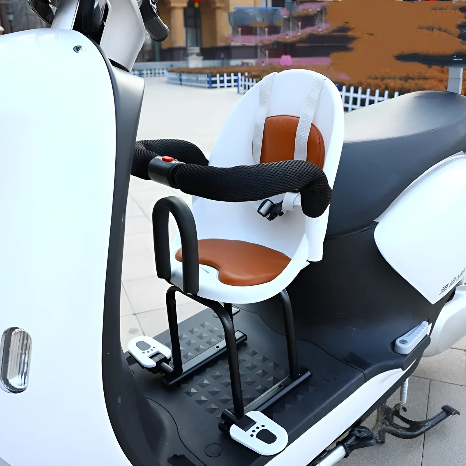 Front-mounted child seat for adult kick scooter in red, showing high-carbon steel frame and secure deck mounting points.