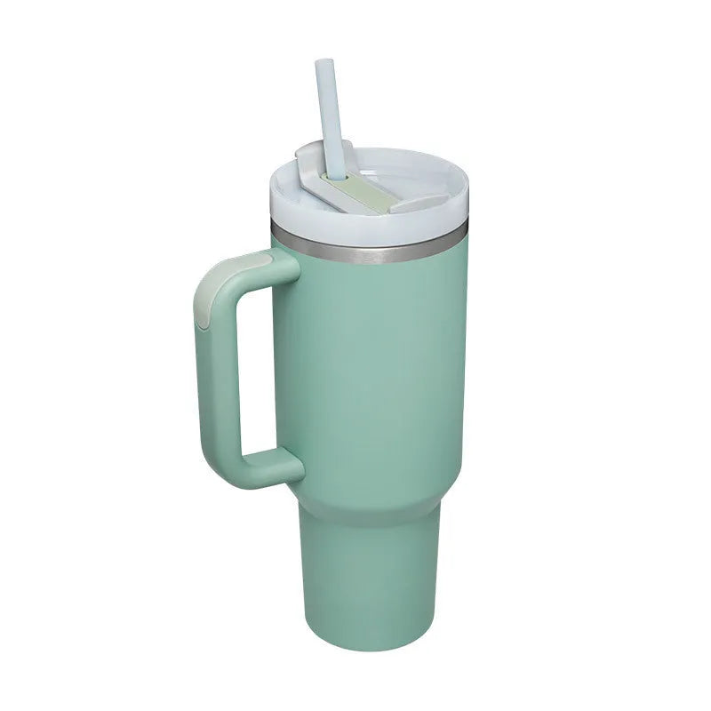 40oz stainless steel tumbler with handle and straw in various colour options showing tapered shape and spill-proof lid