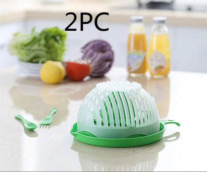 Blue salad cutter bowl showing cutting lid with seams, drain basket function, and reversible base plate