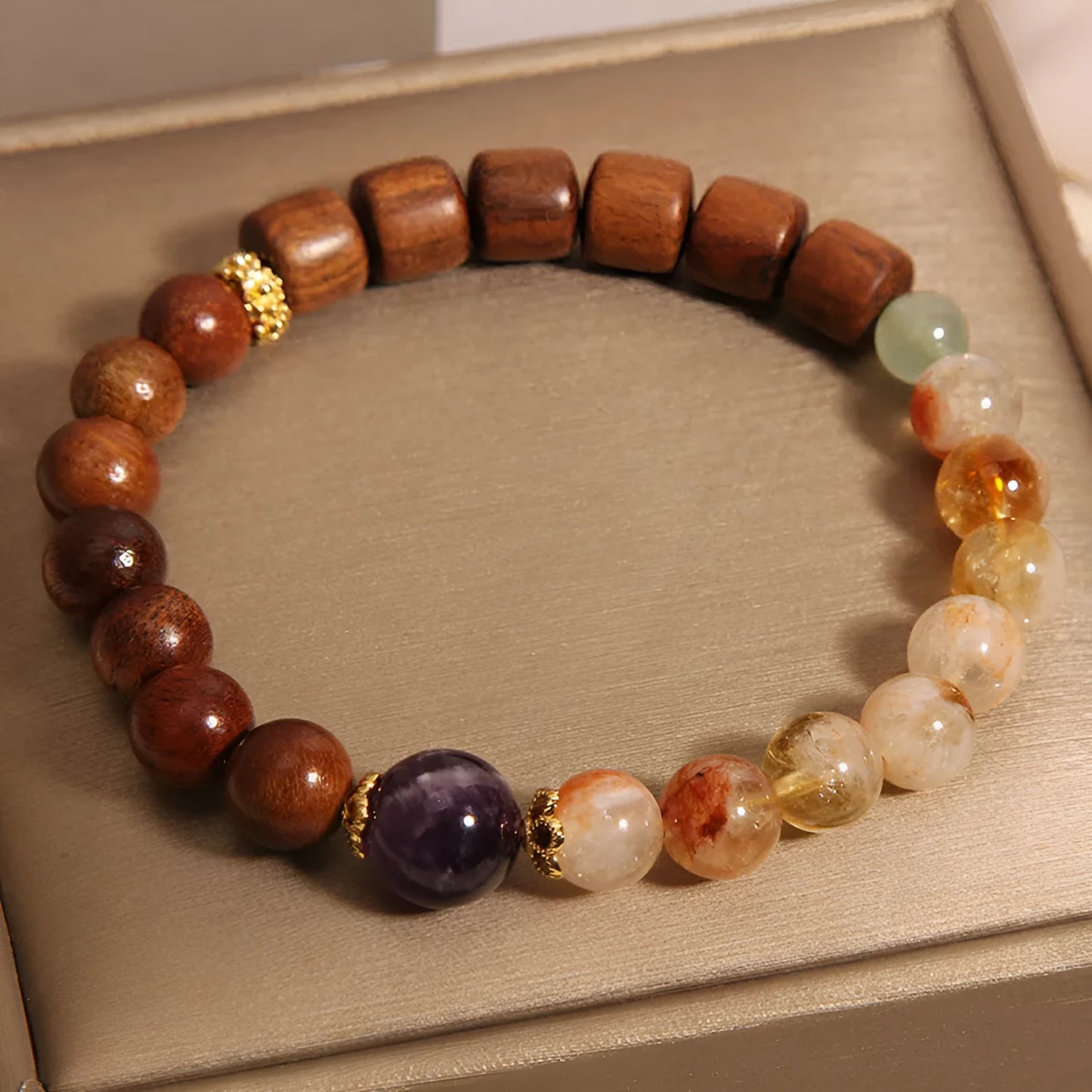 Women's crystal bracelet with yellow tower crystal, ebony amethyst beads, pearl and rhinestone decoration