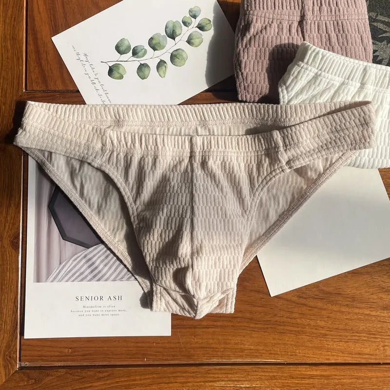 Men's solid colour pure cotton triangle underwear briefs on a mid-waist fit model
