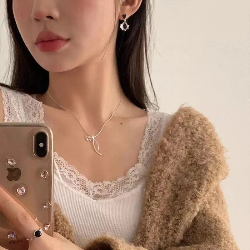 Women's minimalist bow necklace with copper pendant, cross chain, electroplated finish, 41-50cm circumference