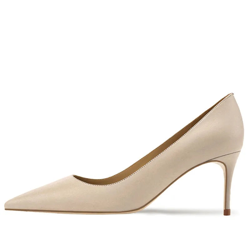 Women's black and nude pointed toe high heel slip-on pumps with soft sole.