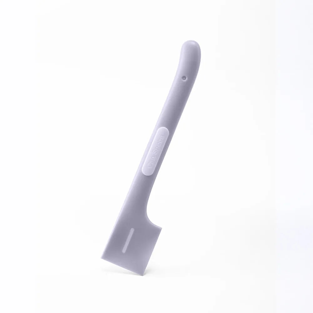 Green long-handle pet feeding spoon with right-angle head for scraping canned wet food.