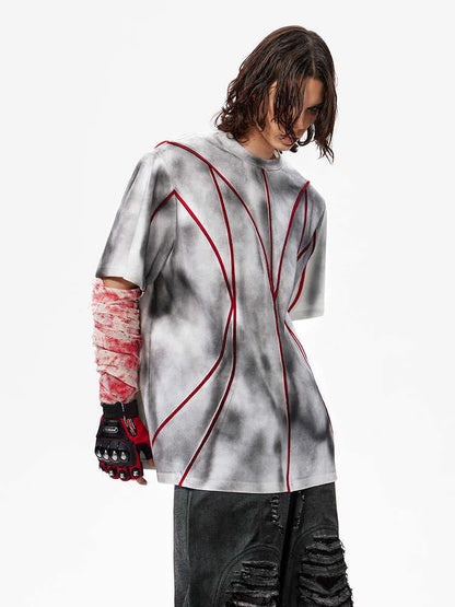 Padded shoulder short sleeve T-shirt with three-dimensional line patchwork detail on a mannequin.