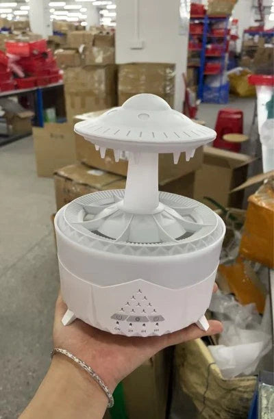Relaxing cloud-shaped humidifier with raindrop sound, essential oil diffusion, and colorful lighting