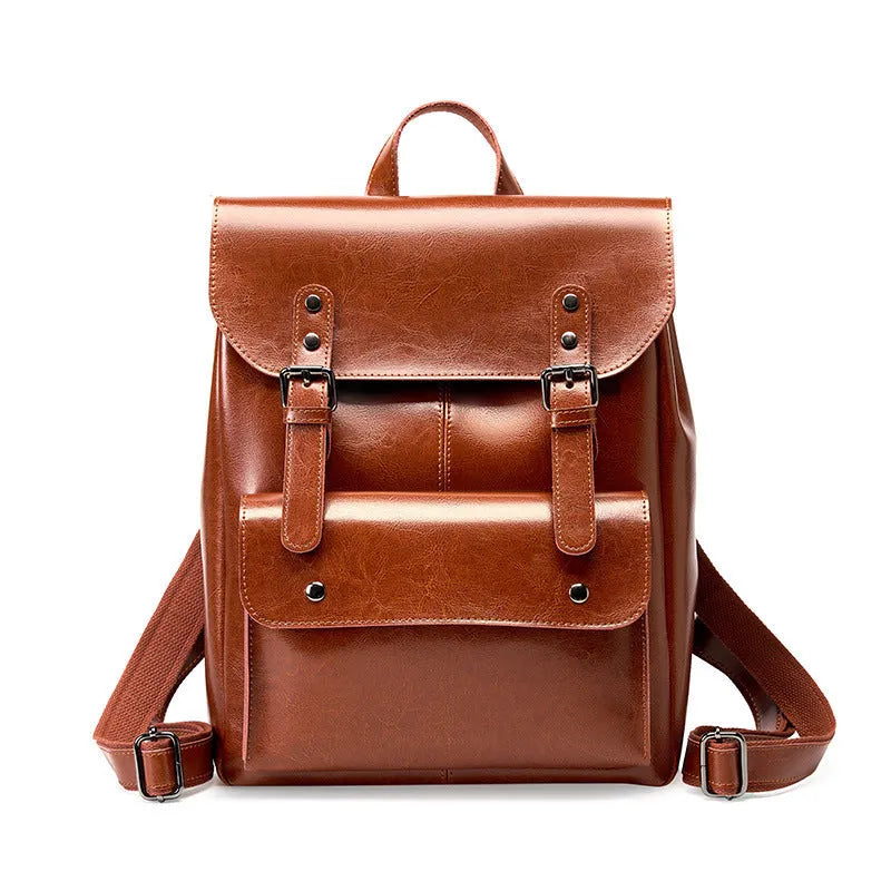 Genuine cowhide leather women's computer backpack in black, shown from a front perspective.