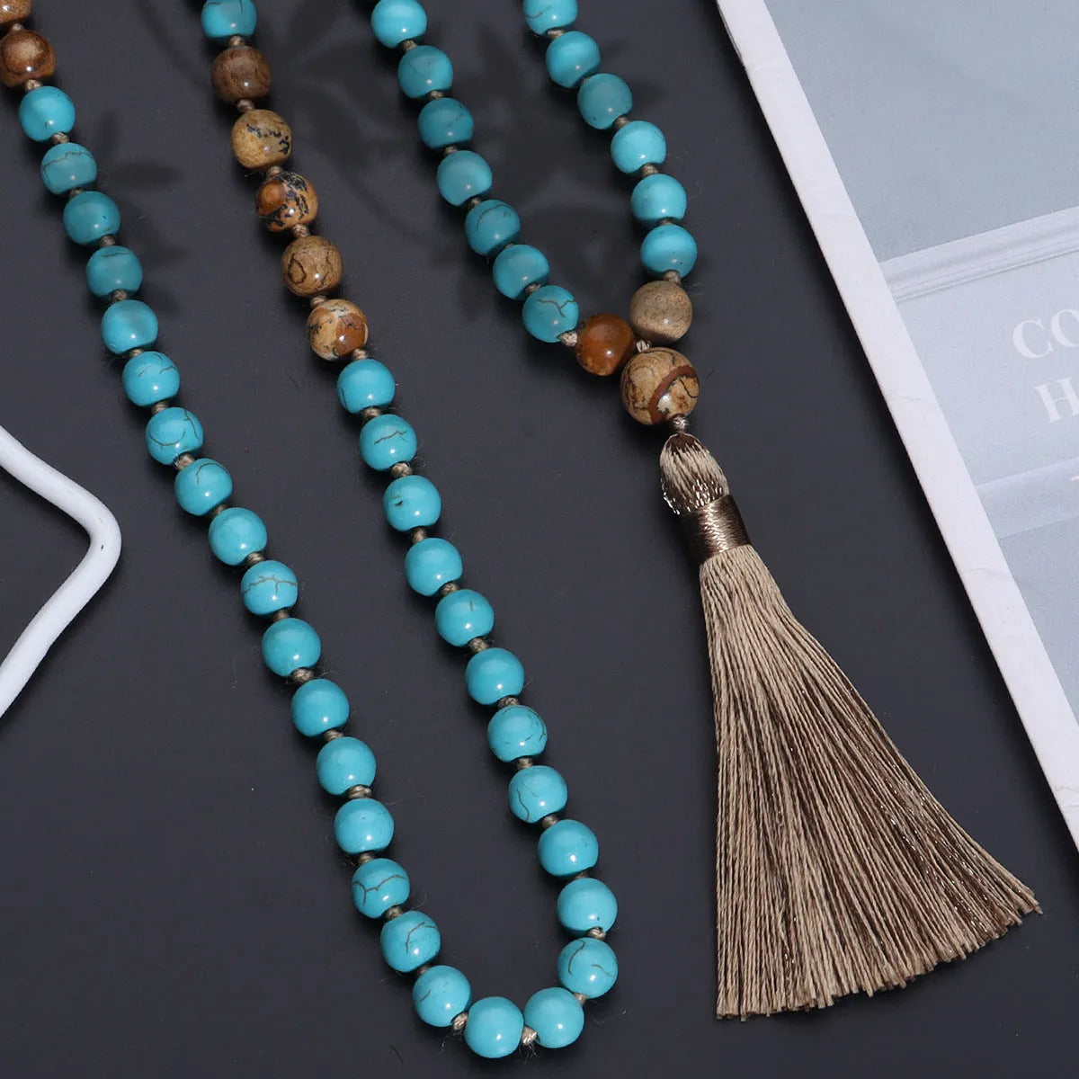 108-bead turquoise mala necklace with geometric ball bead chain showing blue pine stone colour
