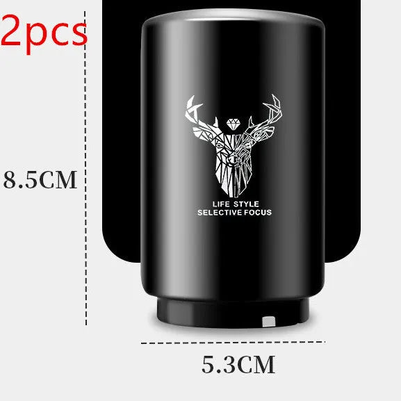 Stainless steel automatic bottle opener measuring 8.4 cm by 5.3 cm on a kitchen counter