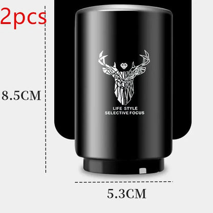 Stainless steel automatic bottle opener measuring 8.4 cm by 5.3 cm on a kitchen counter
