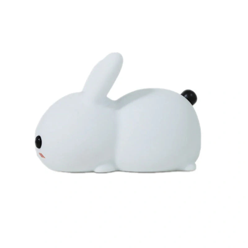 Rabbit-shaped silicone nightlight with warm amber and cool white dual colour illumination, perfect for bedside or home decor