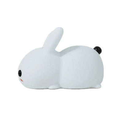 Rabbit-shaped silicone nightlight with warm amber and cool white dual colour illumination, perfect for bedside or home decor