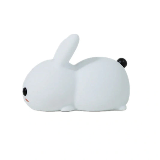 Rabbit-shaped silicone nightlight with warm amber and cool white dual colour illumination, perfect for bedside or home decor