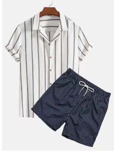 Man wearing a light blue short-sleeve beach shirt and matching shorts from a casual polyester suit set.