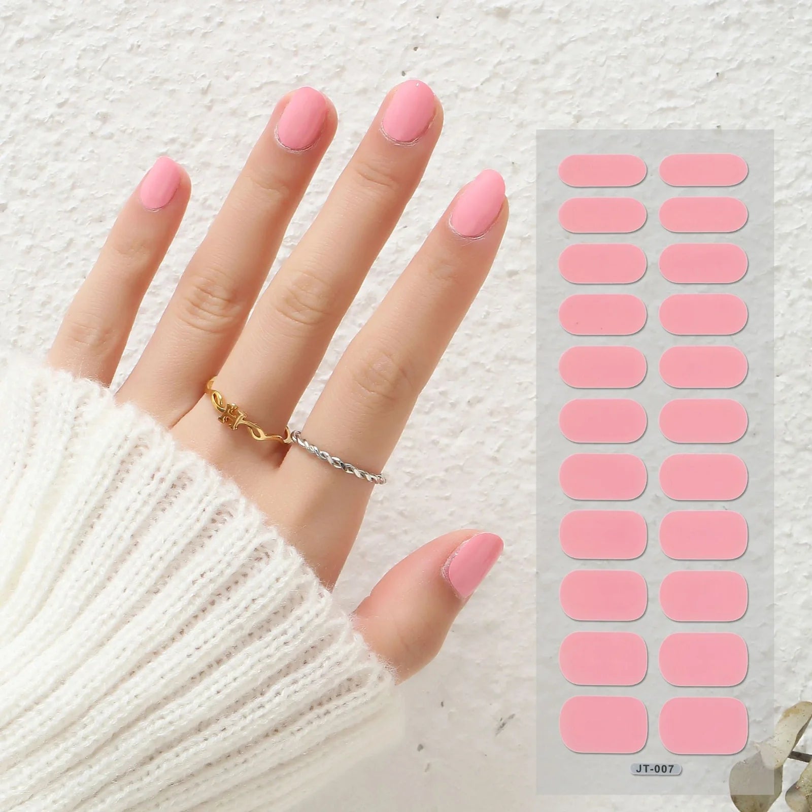 Semi-curing gel nail stickers sheet showing 22 solid colour designs including roses, tulips, and geometric patterns