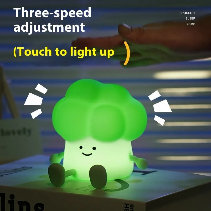 Cartoon eggplant-shaped night light with soft yellow glow measuring 100mm diameter
