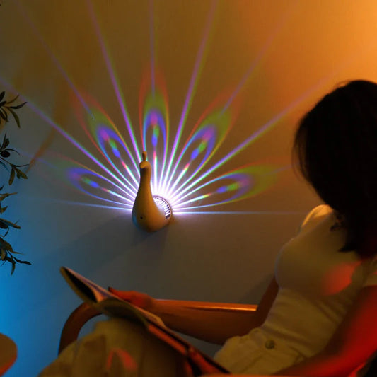 Elegant Peacock Projection Lamp with vibrant 3D peacock feather projections, creating a warm and relaxing atmosphere