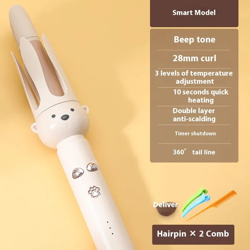 Beige automatic hair curler machine with negative ion technology and included styling stick on a table.