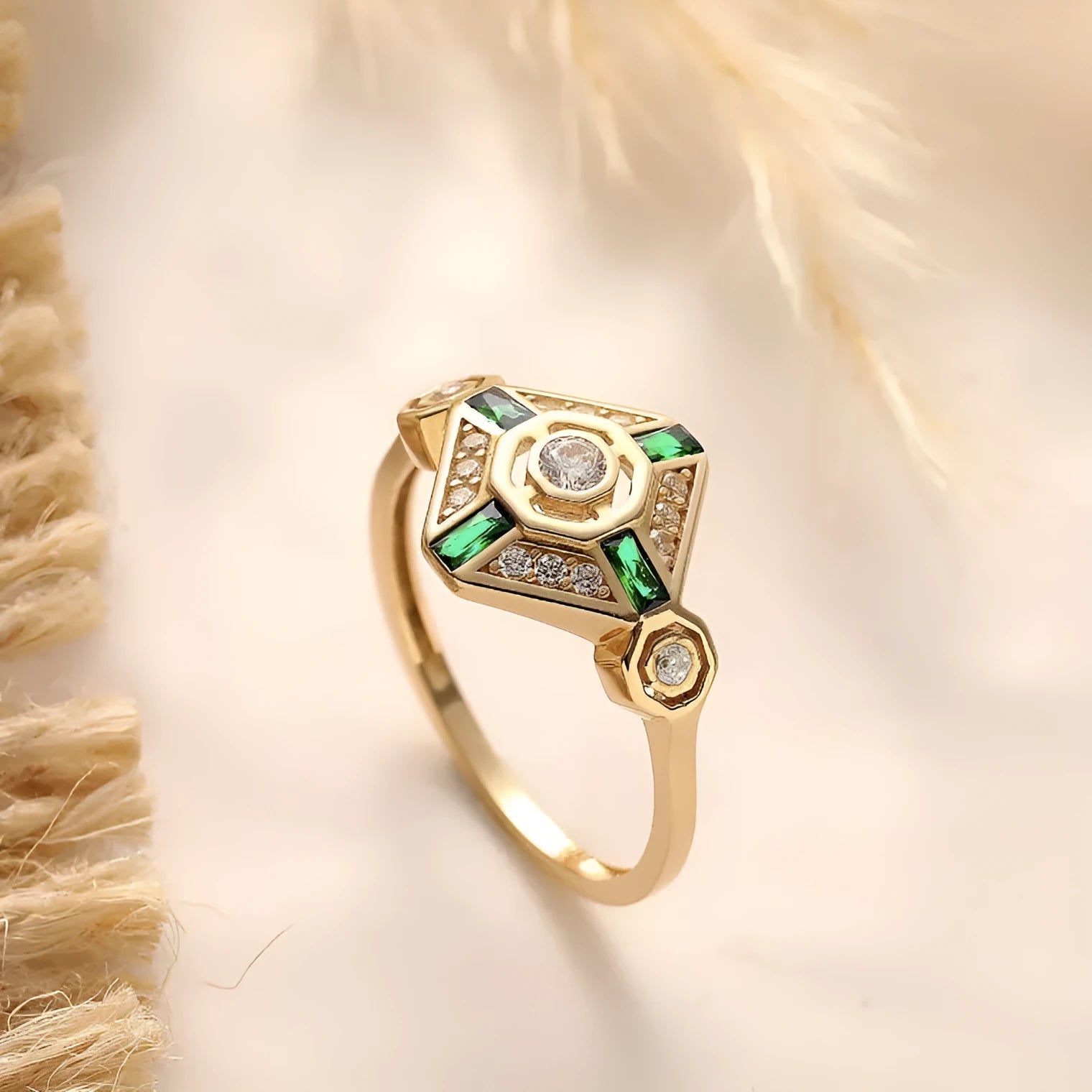 Square geometric gemstone ring with electroplated finish in lvzuan colour, shown on a model's hand.