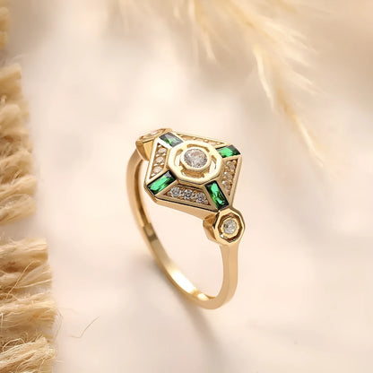 Square geometric gemstone ring with electroplated finish in lvzuan colour, shown on a model's hand.