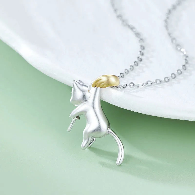 Close-up of a delicate 925 sterling silver cat charm on a 45cm clavicle chain with a lobster clasp.
