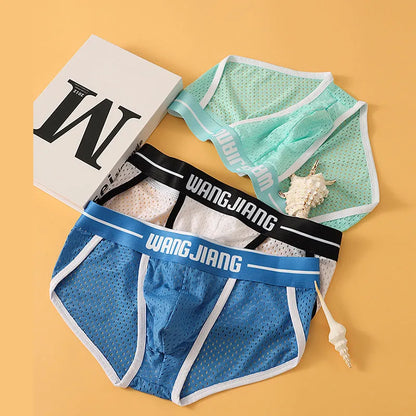 Men's solid colour Ice Silk triangle briefs on a white background, showing the mesh fabric texture.