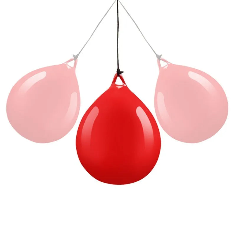 Red water-filled PVC boxing reaction ball with hook rope for hanging speed training drills.