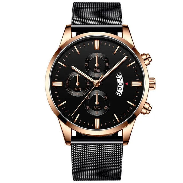 Men's stainless steel mesh band quartz watch with analog dial on a wrist.