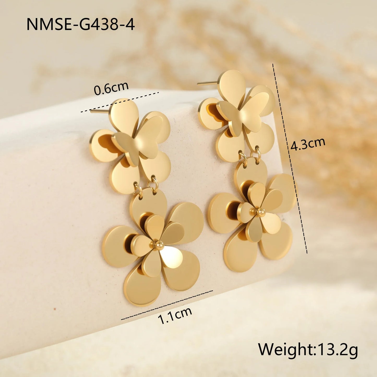 Gold colour flower butterfly stainless steel earrings for women with geometric and zodiac design elements