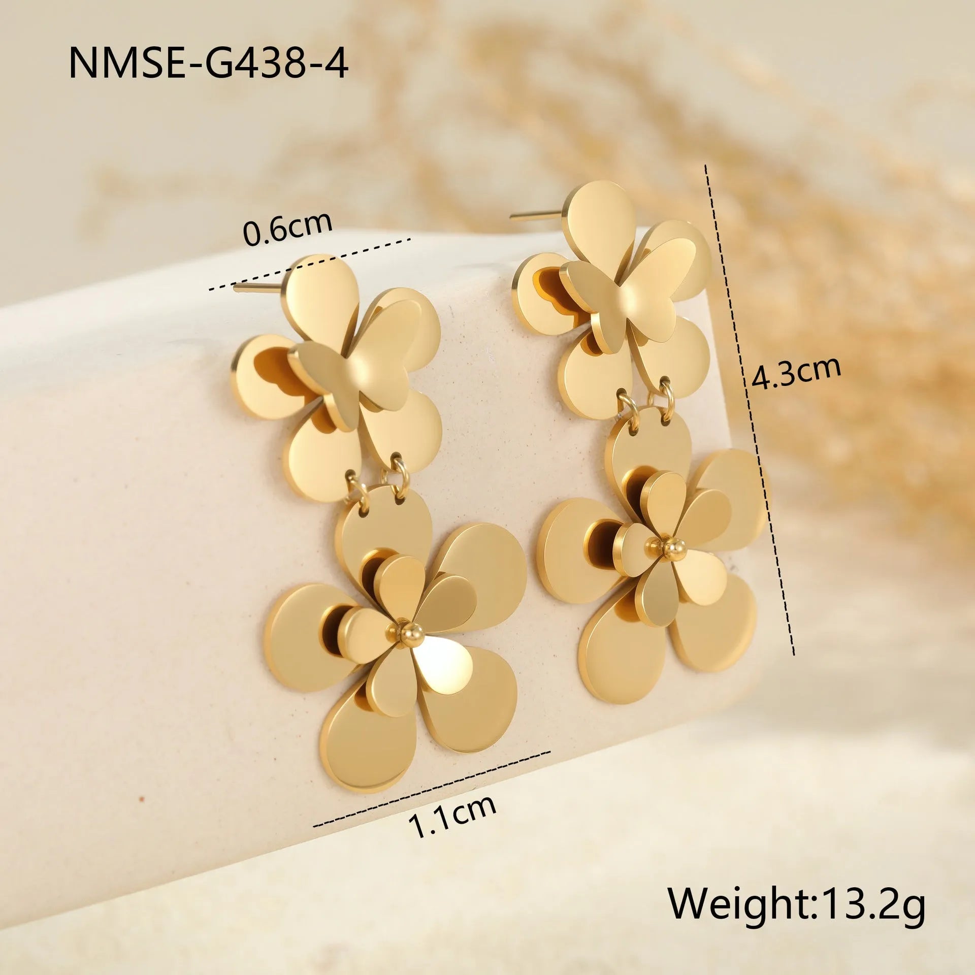 Gold colour flower butterfly stainless steel earrings for women with geometric and zodiac design elements