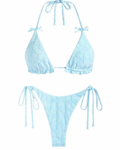 Women's light blue strappy backless bikini swimsuit on a mannequin