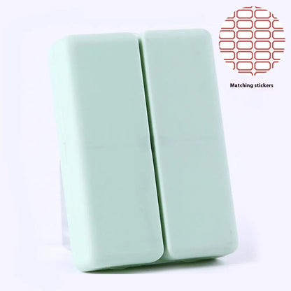 Blue foldable pill box with seven compartments and magnetic closure showing open and closed positions