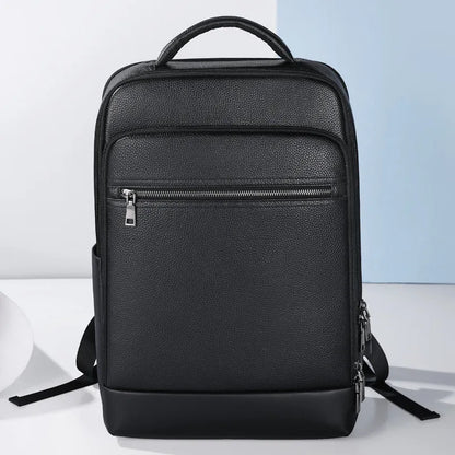 Black leather men's business computer backpack with curved shoulder straps and sewing line details