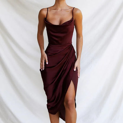 A high-waisted satin midi skirt with a side slit, shown in a solid colour.