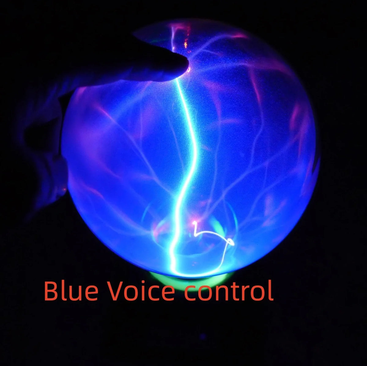 Plasma lightning ball with electrostatic induction showing colourful electrical discharges on glass surface