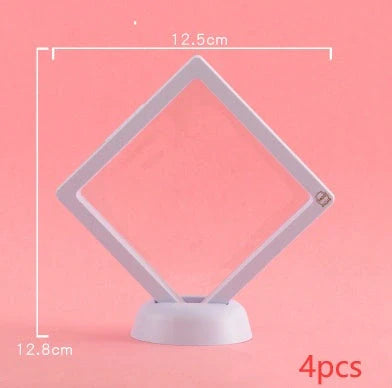 3D floating jewelry coin display stand in white and black, showcasing collectibles in mid-air
