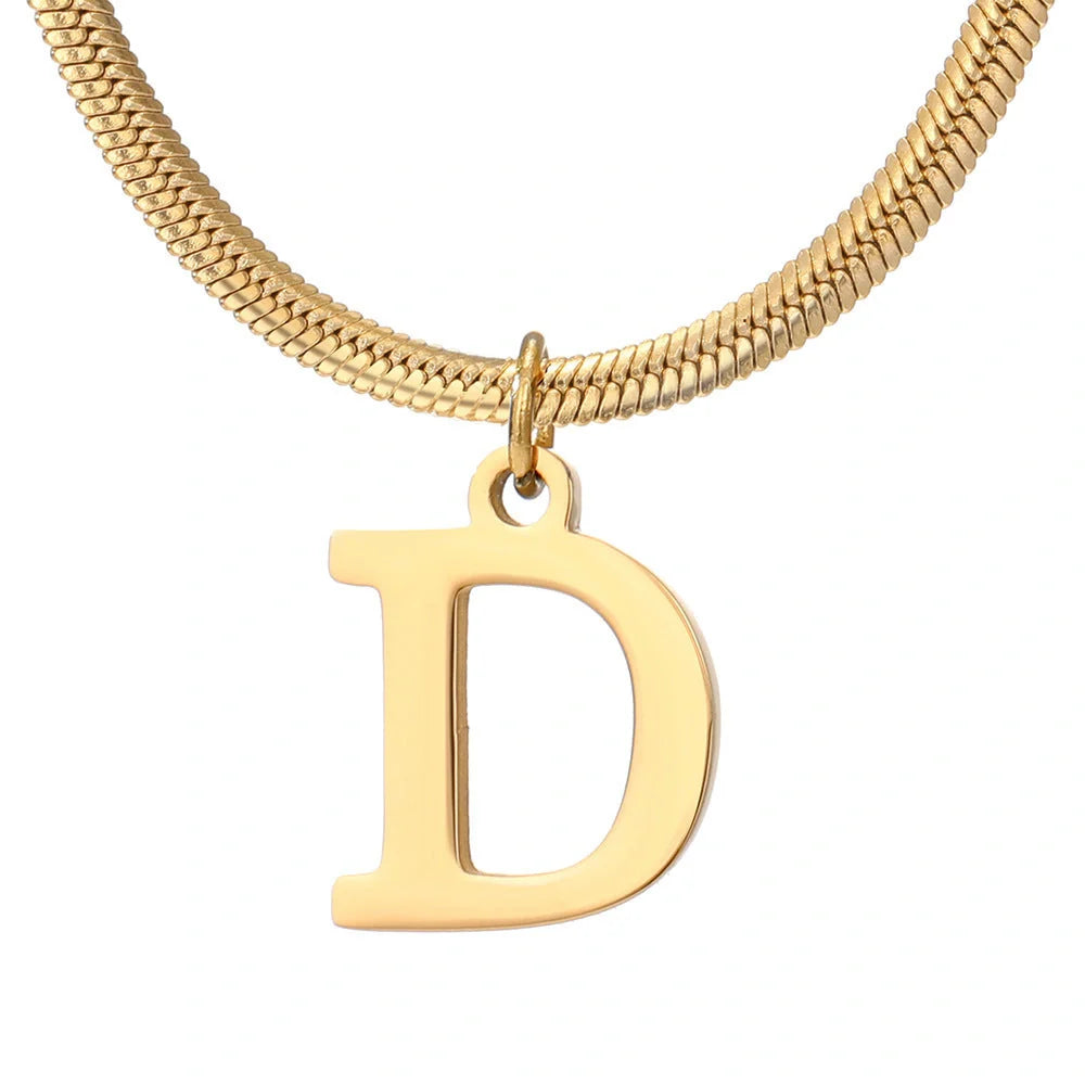 Elegant gold A-Z letter pendant necklace on a snake chain