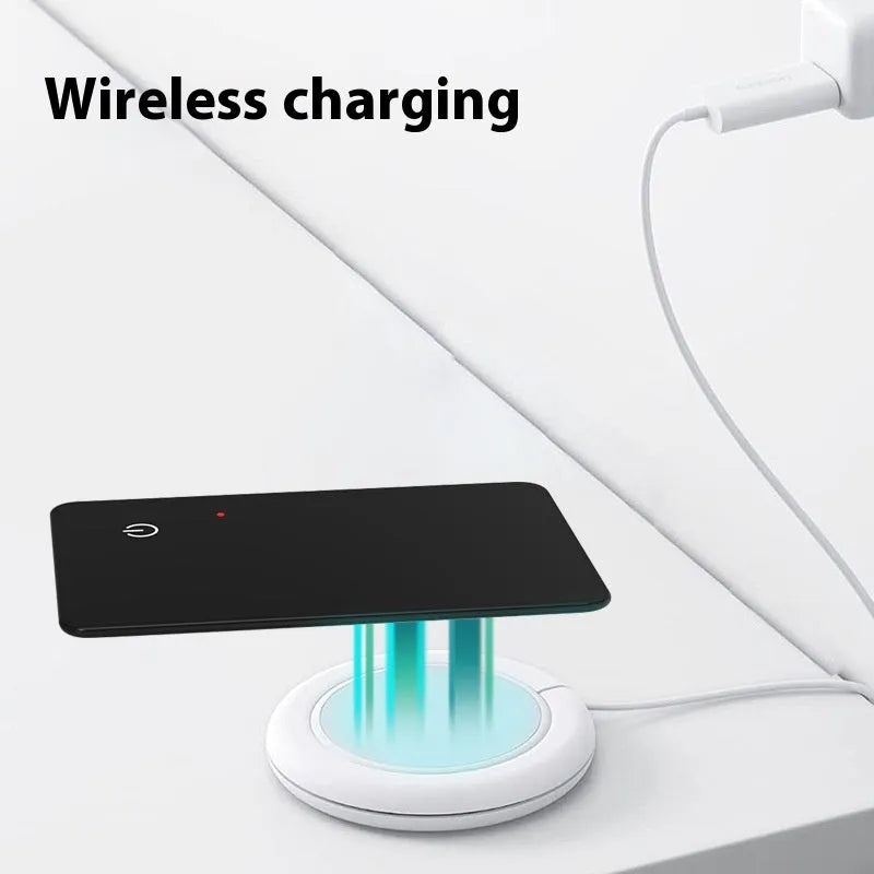 Black card-sized pet tracker with wireless charging and a hanging hole for collar attachment