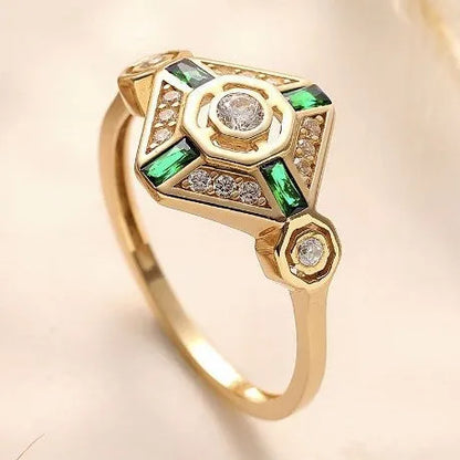Square geometric gemstone ring with electroplated finish in lvzuan colour, shown on a model's hand.
