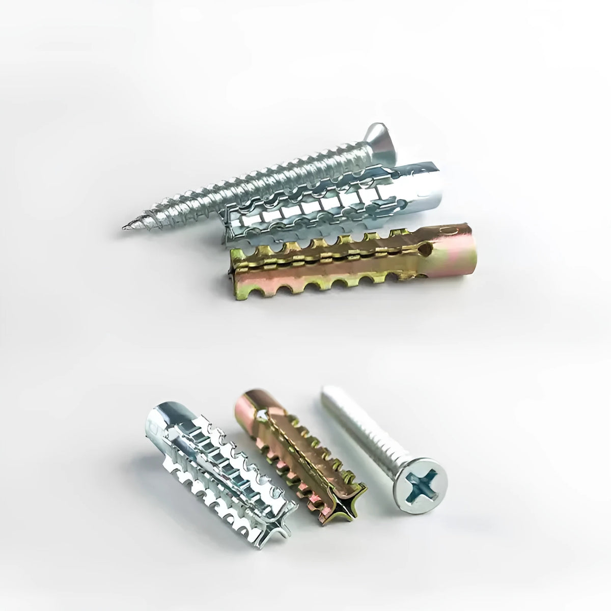 Barbed serrated metal expansion screw anchor for brick and concrete walls in various sizes.