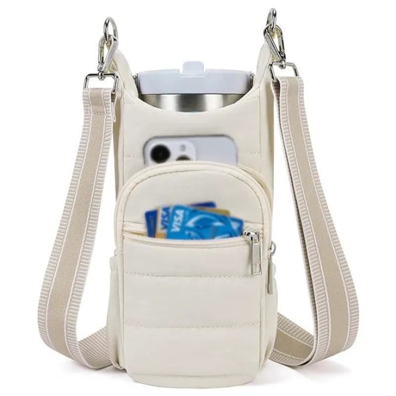 Black cloth water bottle carrier bag mounted on bicycle handlebars