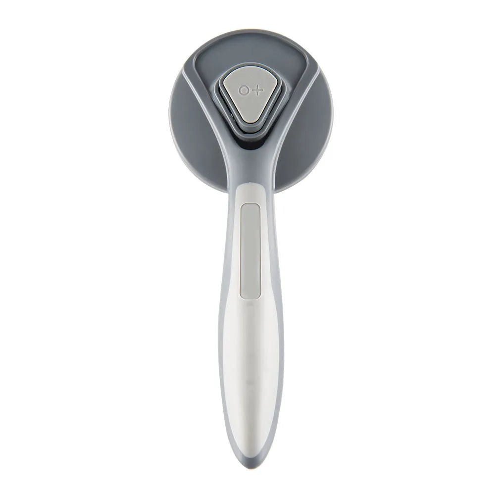 Self-cleaning slicker brush for cats and dogs with massaging bristles and comfort-grip handle