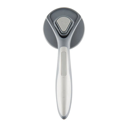 Self-cleaning slicker brush for cats and dogs with massaging bristles and comfort-grip handle
