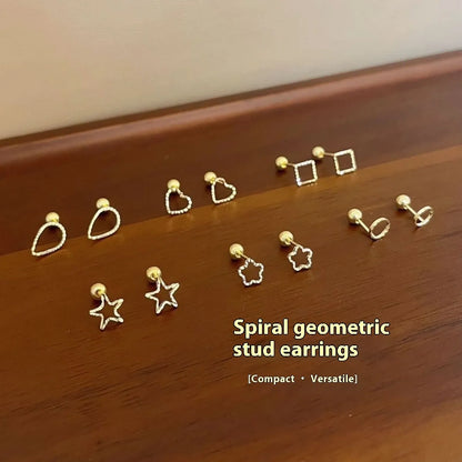 Pair of small spiral geometric ear studs with gold hollow thread finish in mixed material, shown in eight shape options.