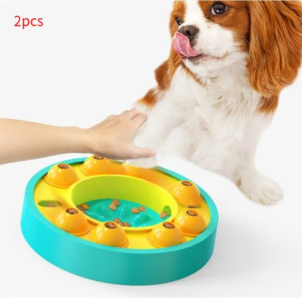 Square lake blue dog puzzle feeder with central column and rotating roulette top on a kitchen floor